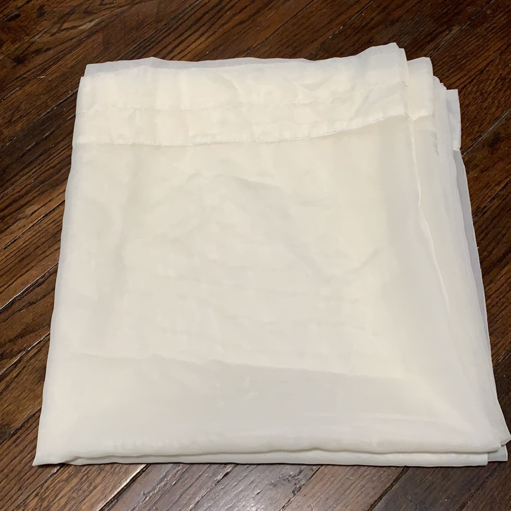 2 Sheer off white curtains. 58x62